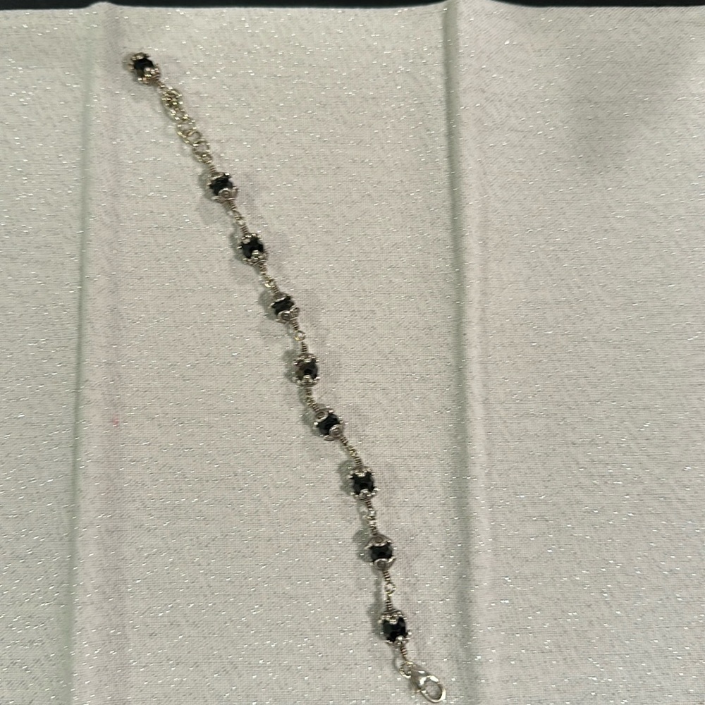 Silver and black link bracelet